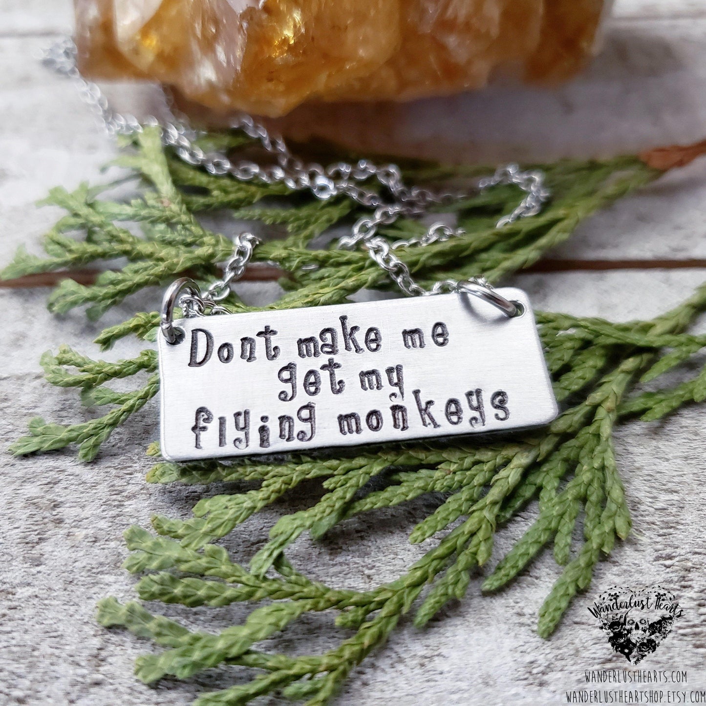 Flying monkeys necklace
