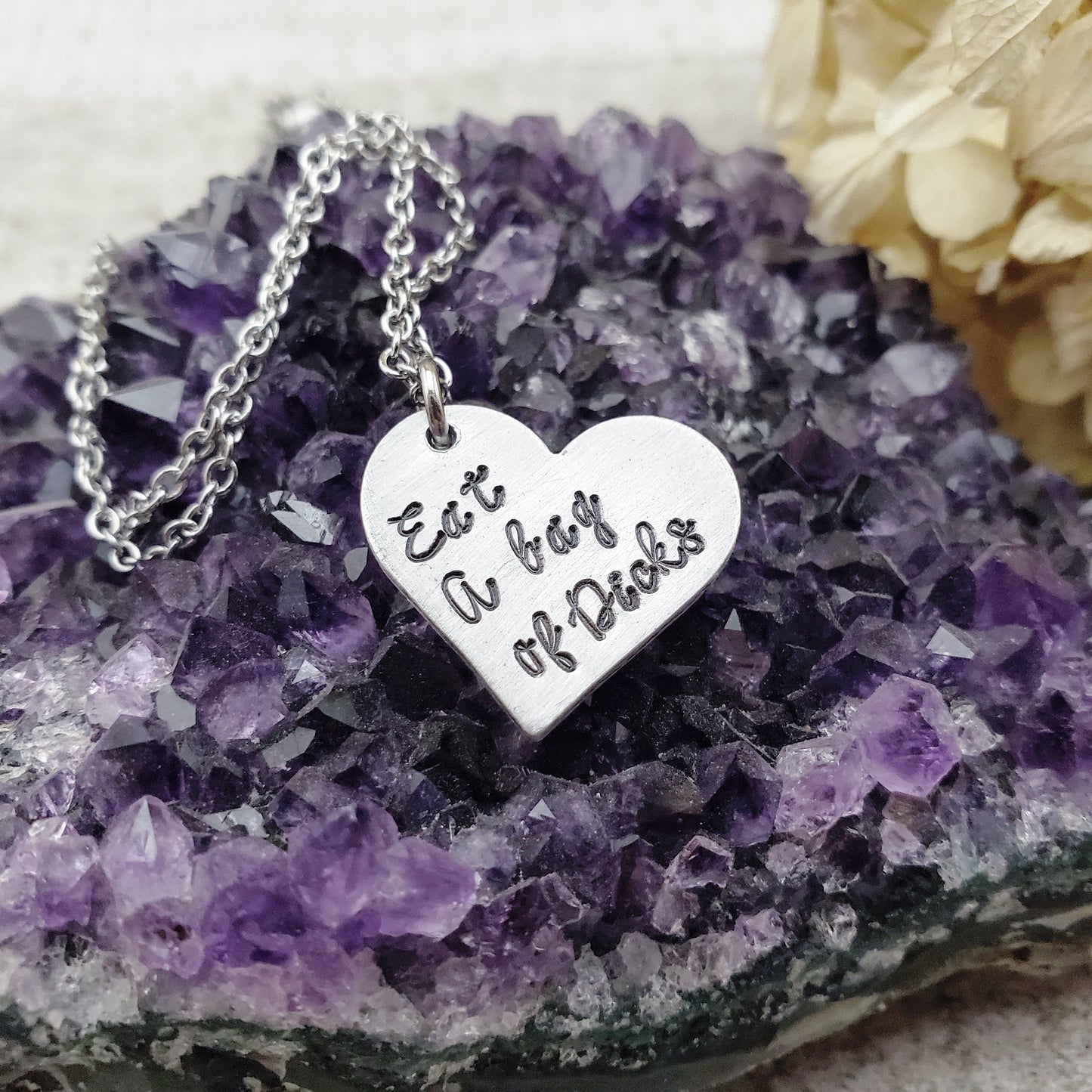 Eat a bag of D*cks necklace