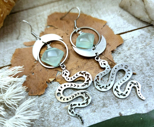 Silver snake asymmetrical earrings