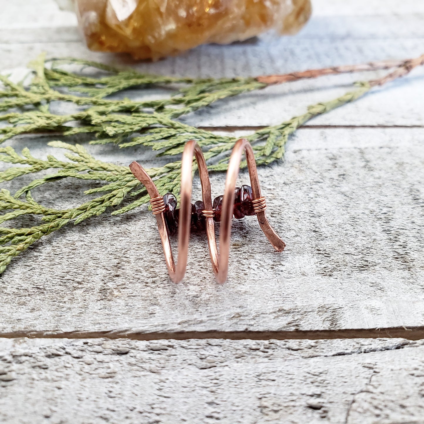 Garnet copper twist ring