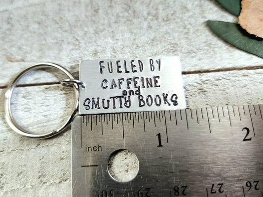 Fueled by smut book keychain